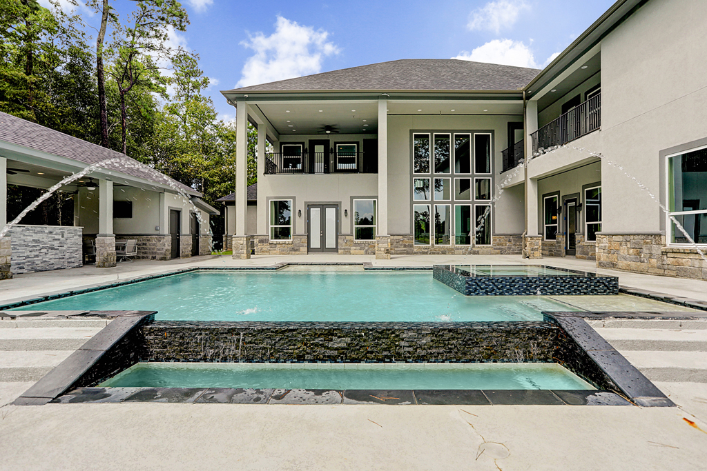 Iconic Custom Home Builders in HOUSTON, TX : A astonishing photo capturing a stunning scenery. Its hues are bold and mix flawlessly. Its layout looks wonderful, and its features are very clear.