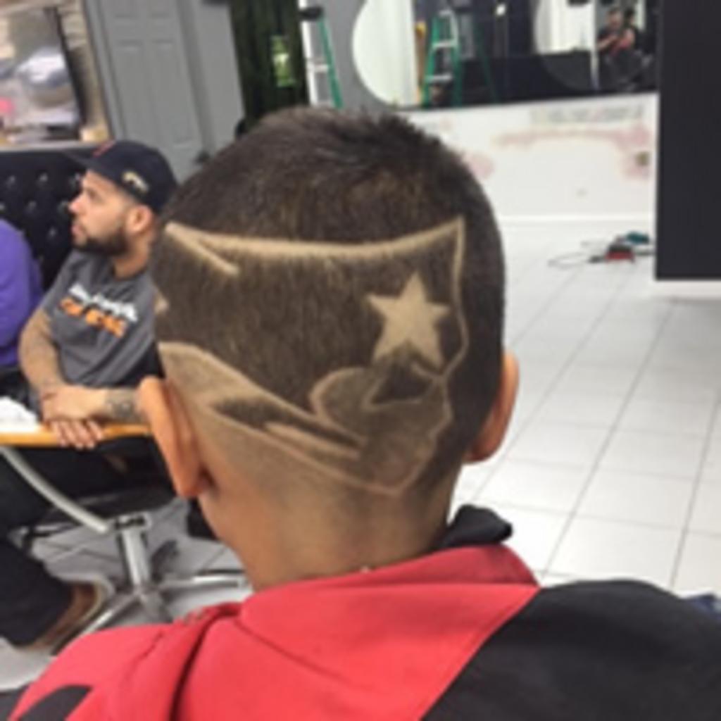 Adrian's Barber Shop in Woburn, MA